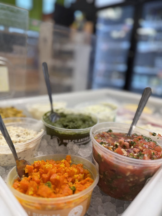 Backyard Buffalo chutneys, carrot pickle and raita on ice